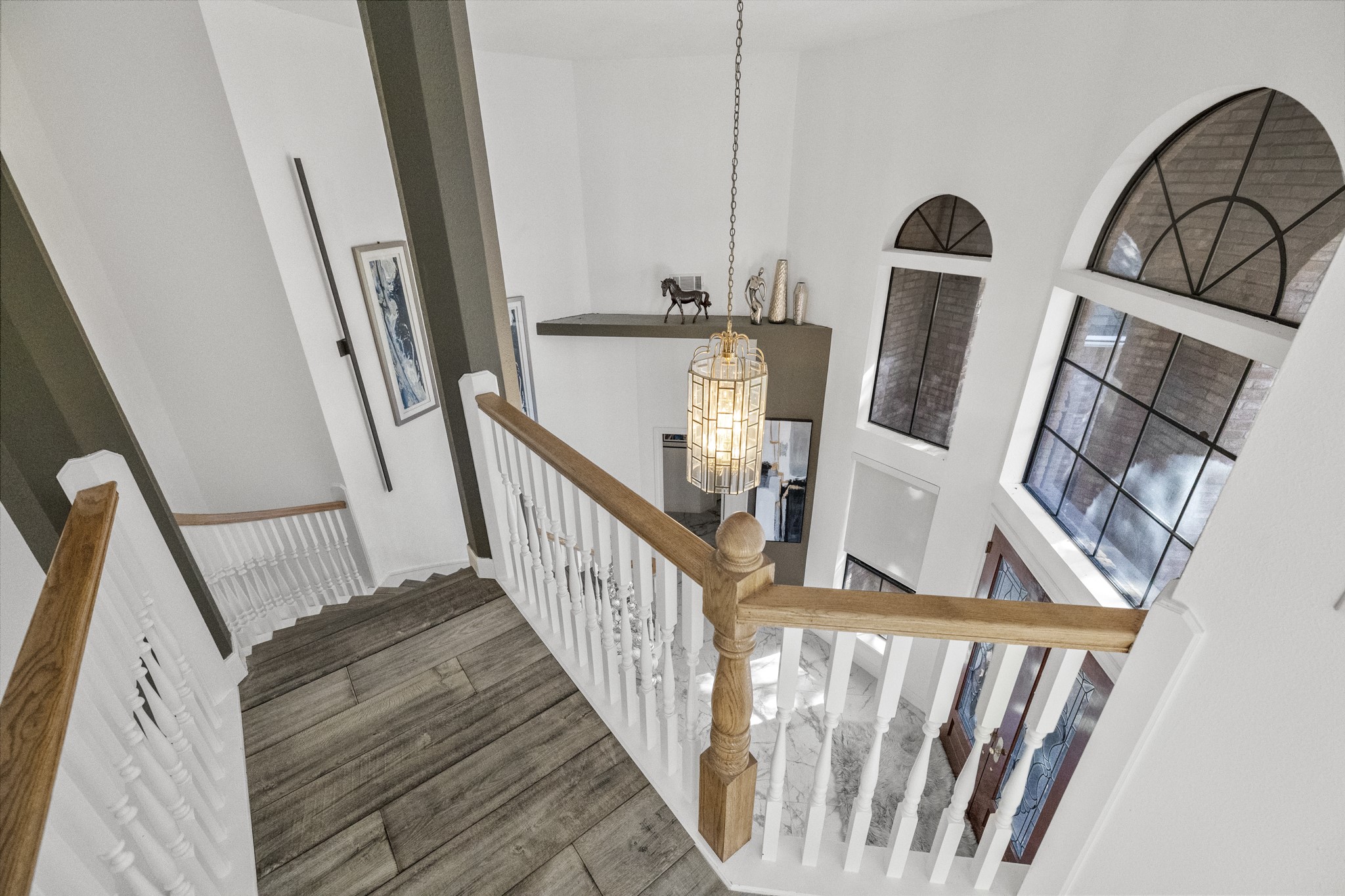 5107 Waterbeck Street Fulshear, TX 77441 - Photo 22 of 30 a view of staircase with railing and stairs