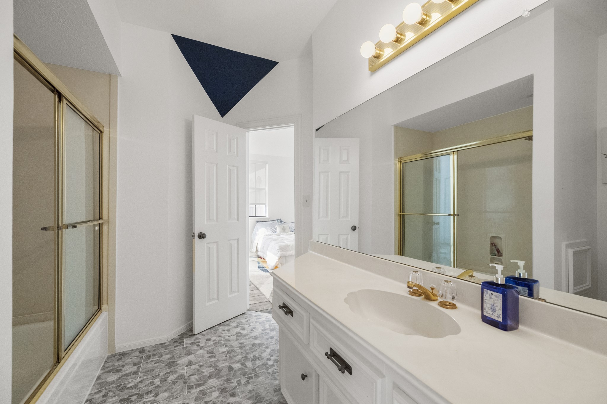 5107 Waterbeck Street Fulshear, TX 77441 - Photo 26 of 30 a spacious bathroom with a tub sink and mirror