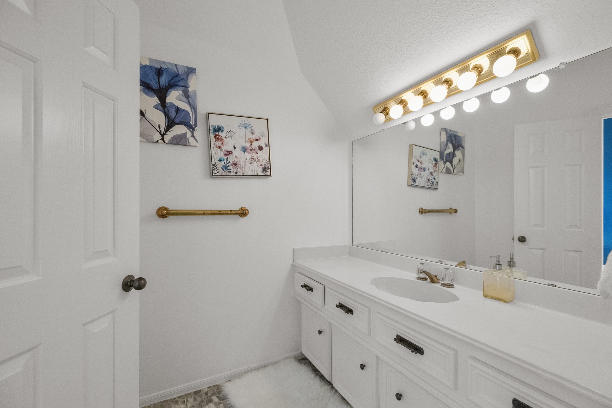 5107 Waterbeck Street Fulshear, TX 77441 - Photo 28 of 30 a bathroom with a sink vanity and mirror