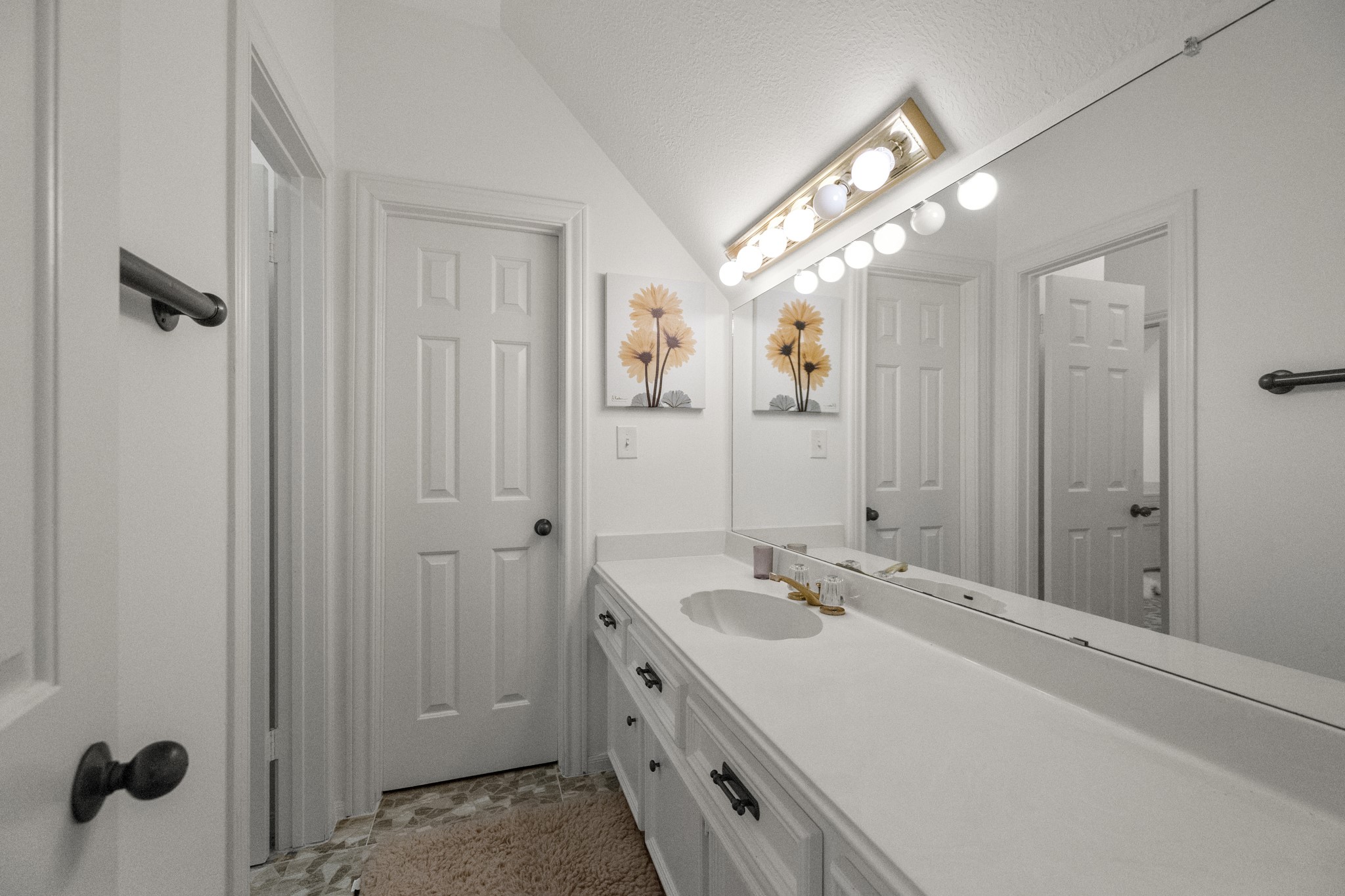 5107 Waterbeck Street Fulshear, TX 77441 - Photo 29 of 30 a spacious bathroom with a shower a sink and mirror