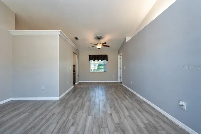 a view of an empty room and window