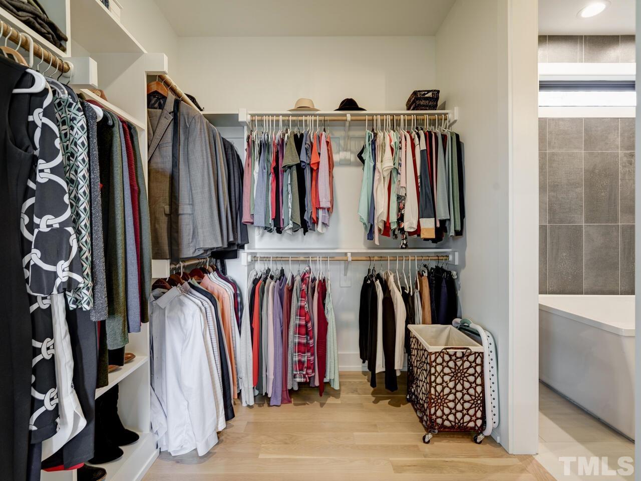 220 Hargrove Street Durham, NC 27701 - Photo 36 of 76 a view of walk in closet with clothes