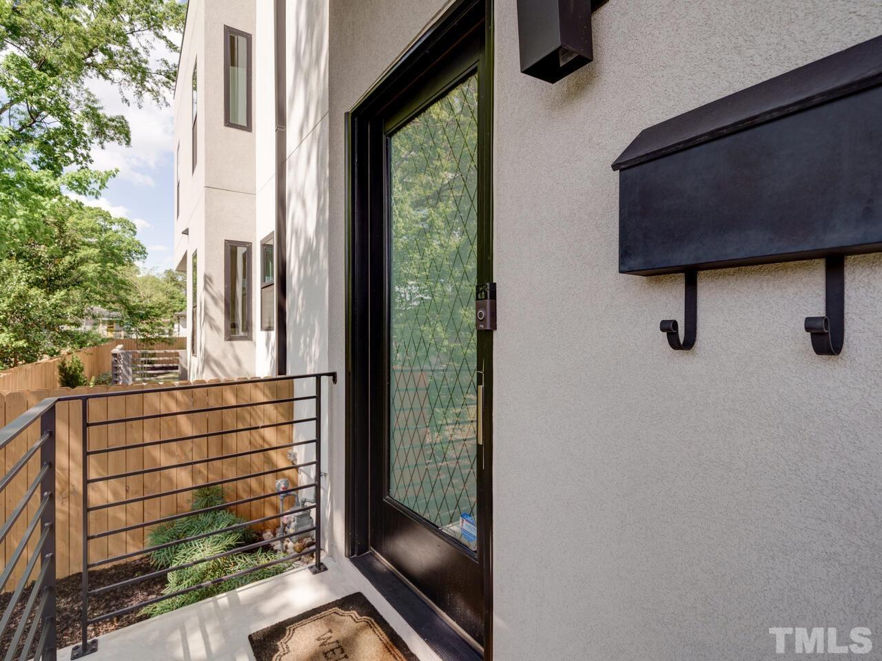 220 Hargrove Street Durham, NC 27701 - Photo 4 of 76 a view of a glass door and a window