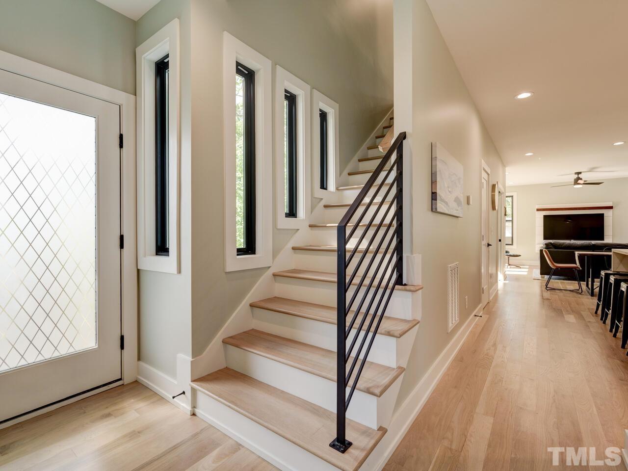 220 Hargrove Street Durham, NC 27701 - Photo 5 of 76 a view of entryway and hall with wooden floor