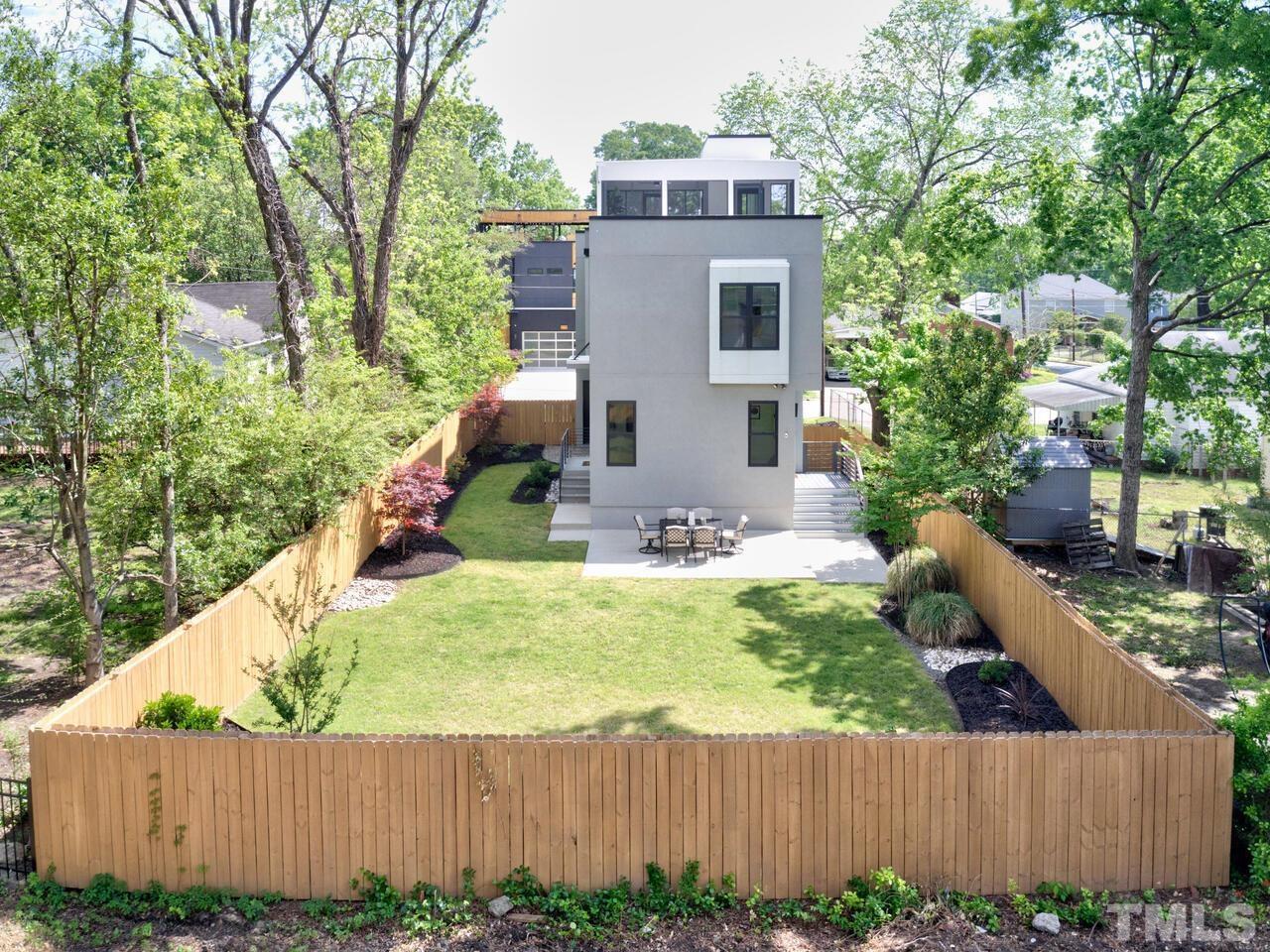 220 Hargrove Street Durham, NC 27701 - Photo 57 of 76 a front view of house with yard and trees around