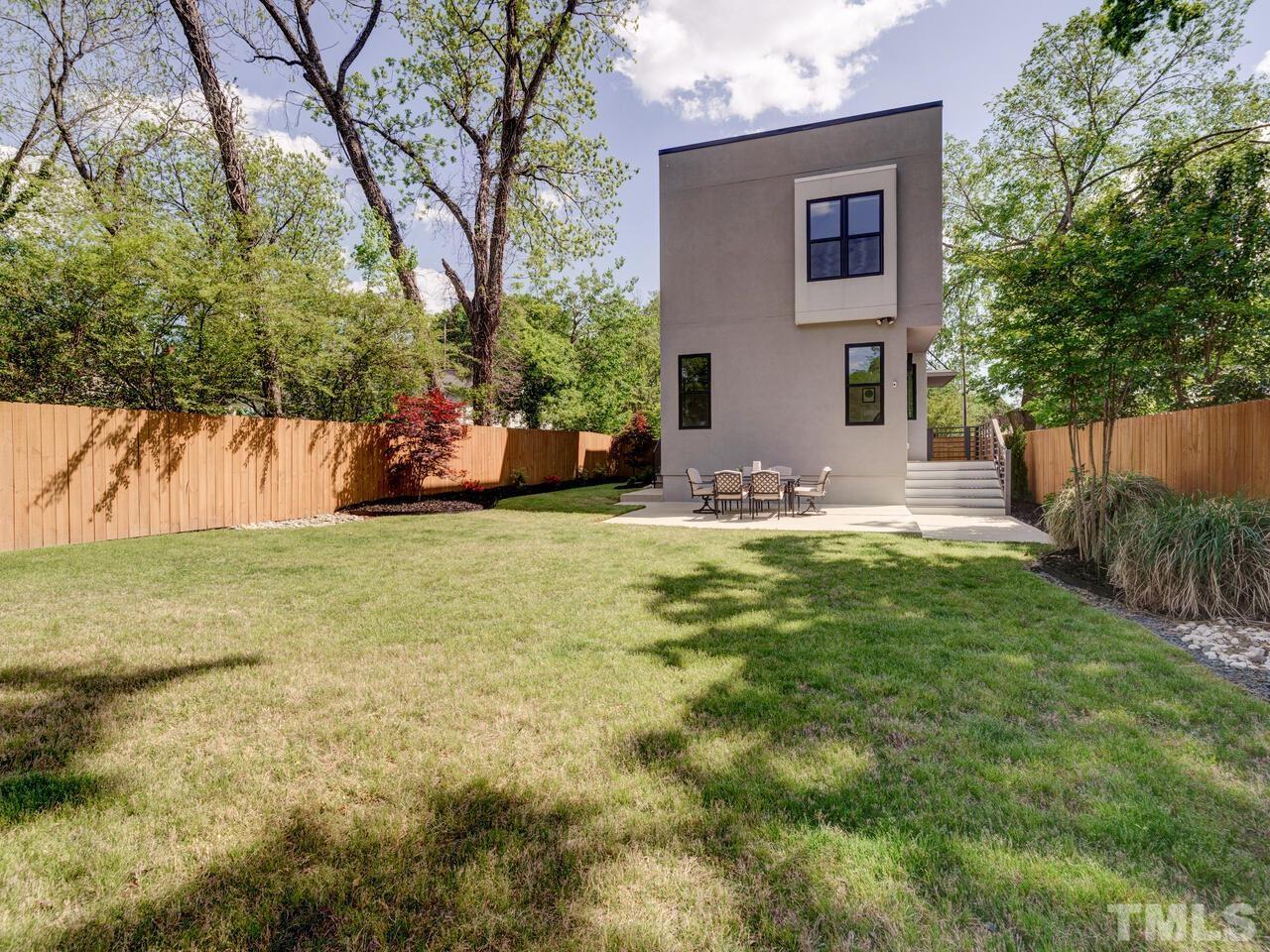220 Hargrove Street Durham, NC 27701 - Photo 59 of 76 a view of a house with a yard and tree s