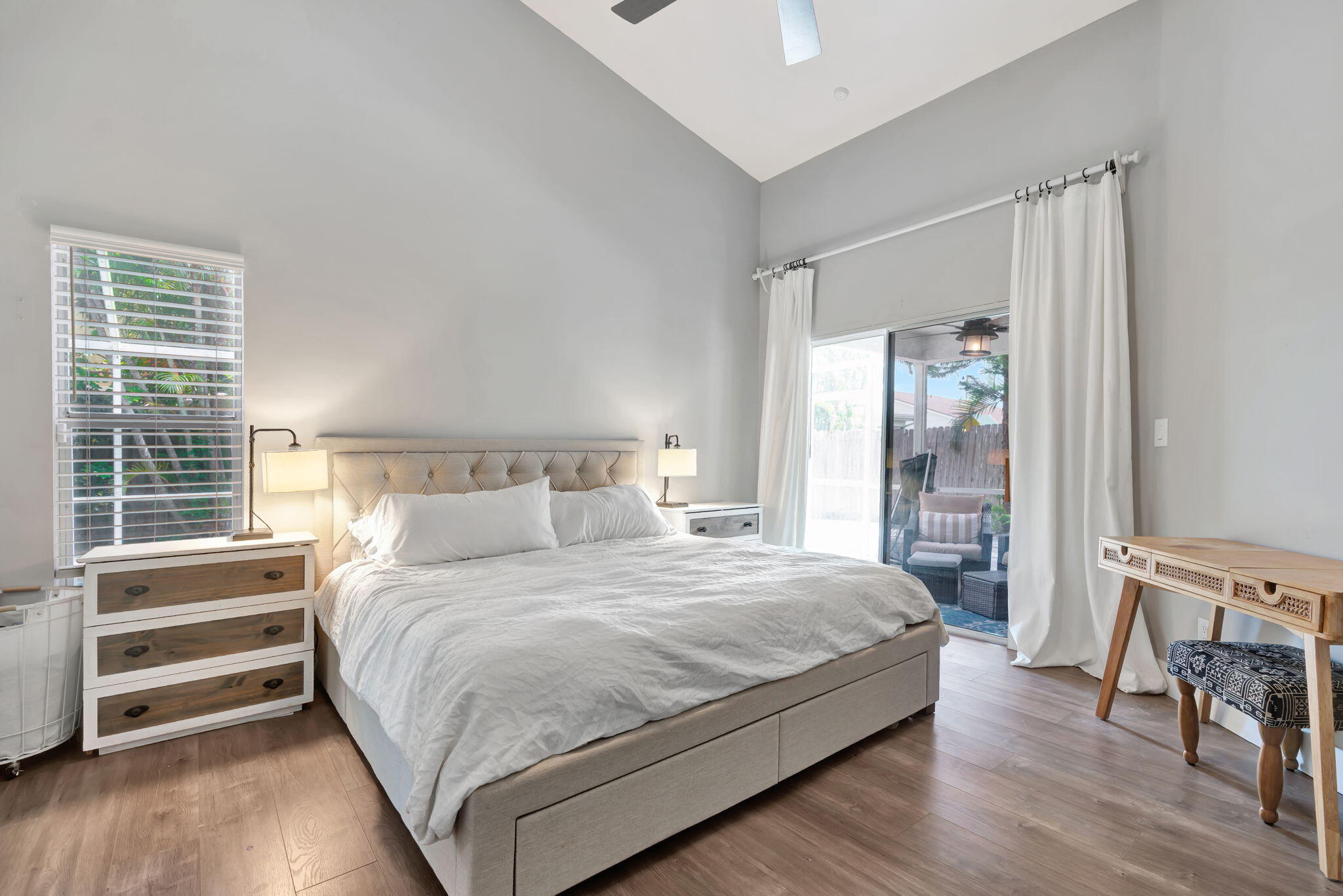 6247 Ungerer Street Jupiter, FL 33458 - Photo 26 of 36 a bedroom with a bed and a window