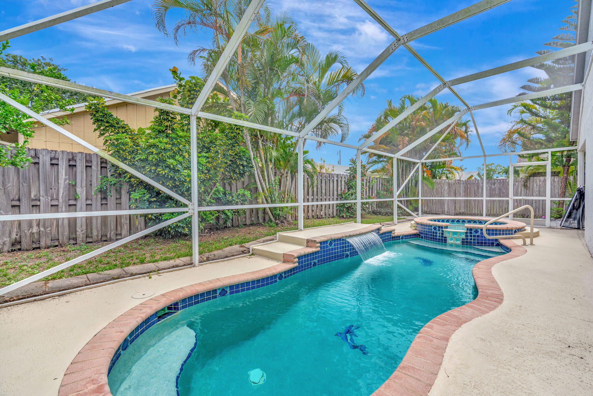 6247 Ungerer Street Jupiter, FL 33458 - Photo 35 of 36 a view of a backyard with swimming pool