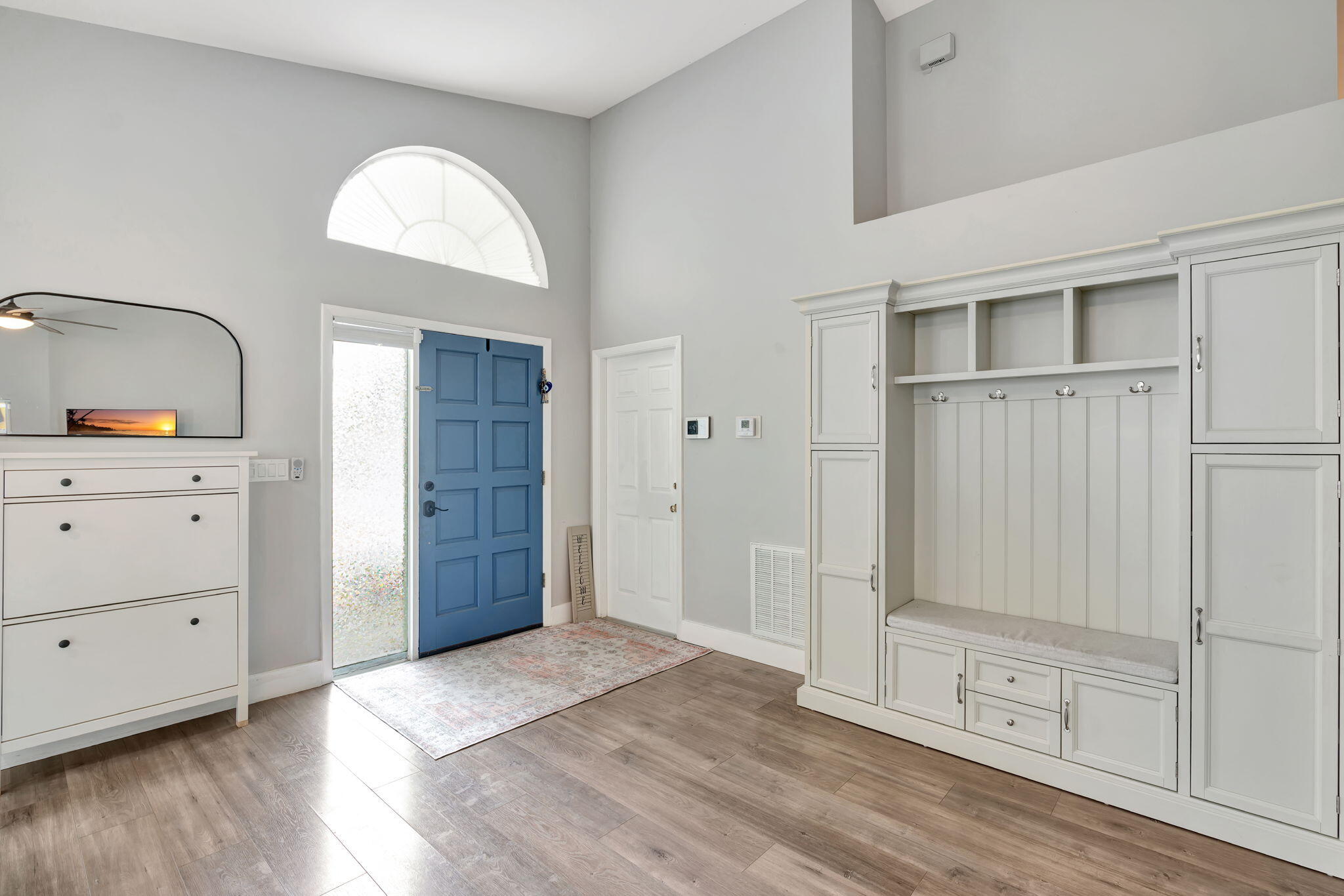 6247 Ungerer Street Jupiter, FL 33458 - Photo 6 of 36 a view of an empty room with closet and a window