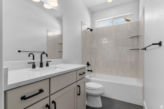 11749 South Halls Crk Road Draper, UT 84020 - Photo 7 of 21 Bathroom featuring vanity, tub / shower combination, and tile patterned flooring