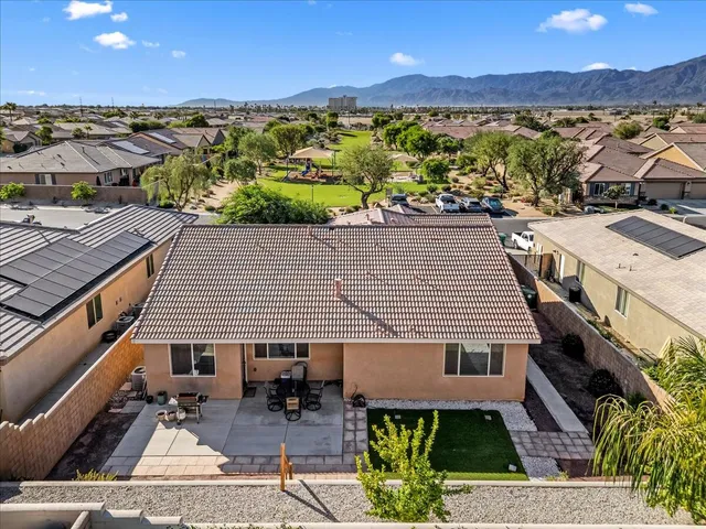 a view of a park with large trees