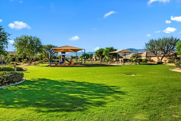 a view of a city with lawn chairs