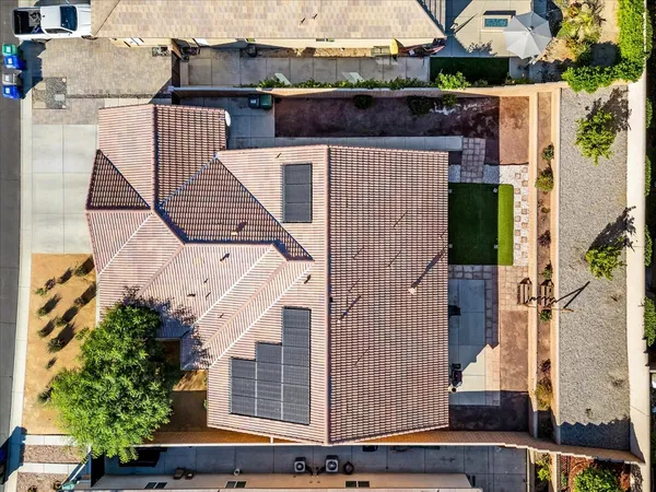 a view of a swimming pool with a patio