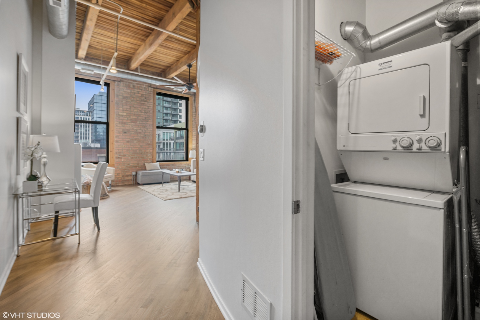616 West Fulton Street, Unit 408 Chicago, IL 60661 - Photo 13 of 14 a view of washer and dryer