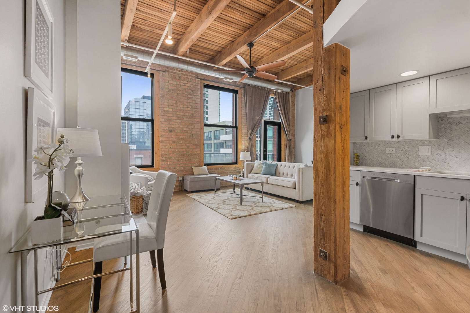 616 West Fulton Street, Unit 408 Chicago, IL 60661 - Photo 9 of 14 a view of a livingroom with furniture and a window