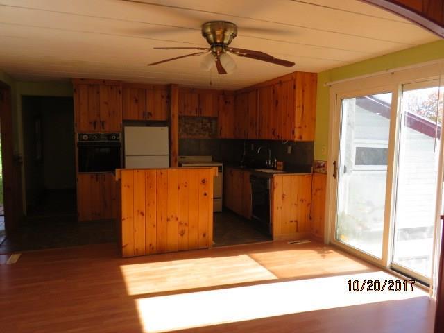 112 Maplecrest Road Parsonsfield, ME 04047 - Photo 6 of 18 Kitchen/dining features knotty pine...