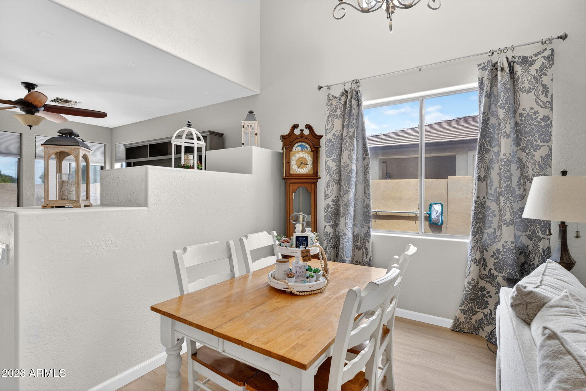 6280 South Sinova Court Gilbert, AZ 85298 - Photo 10 of 64 a view of a dining room with furniture and window