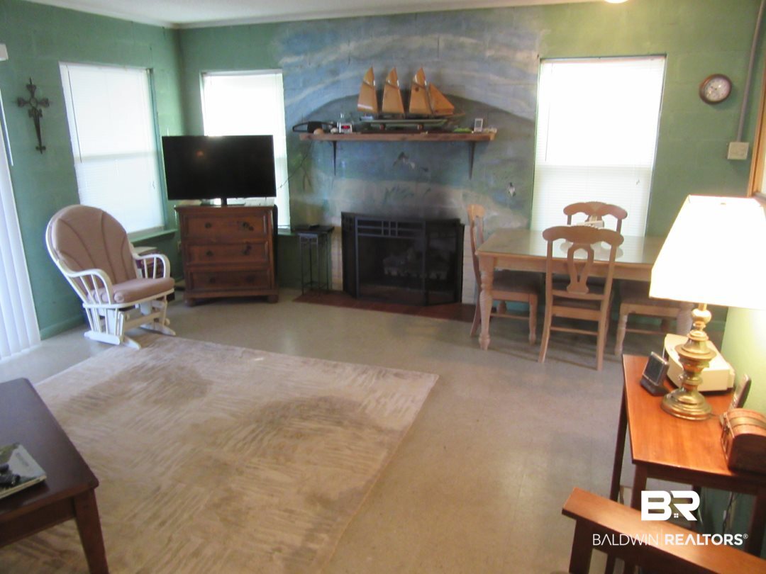 10289 Pleasure Point Road Gulf Shores, AL 36542 - Photo 8 of 46 Living & Fireplace