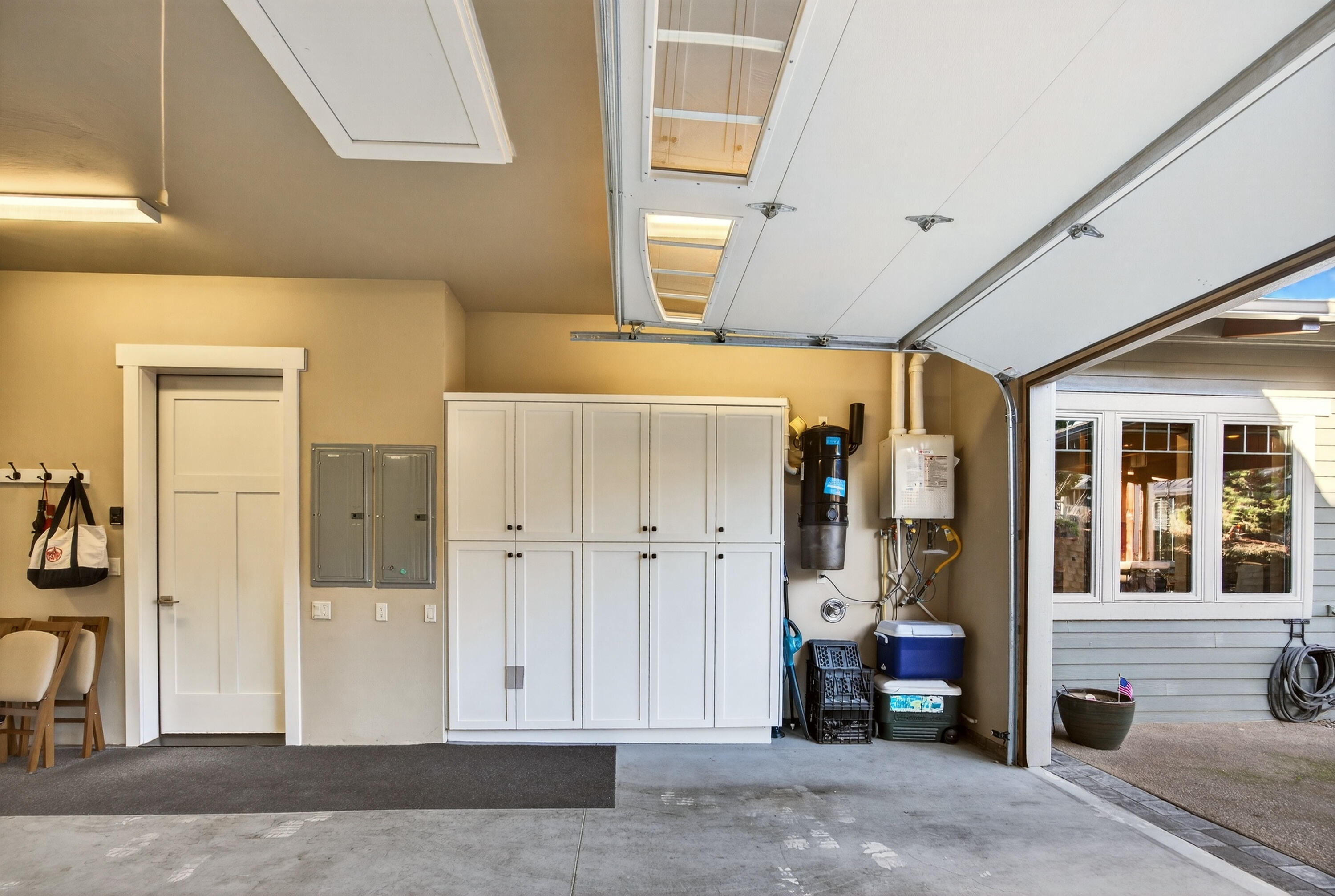 930 Granite Ridge Circle Jacksonville, OR 97530 - Photo 70 of 79 Abundance of built-in cabinets and attic storage access.