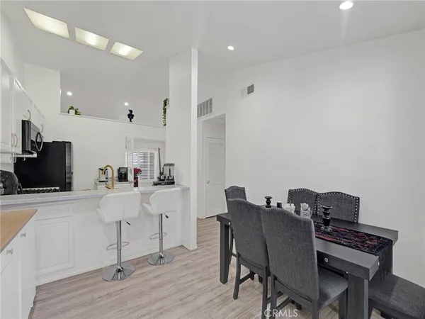 a view of a dining room with furniture