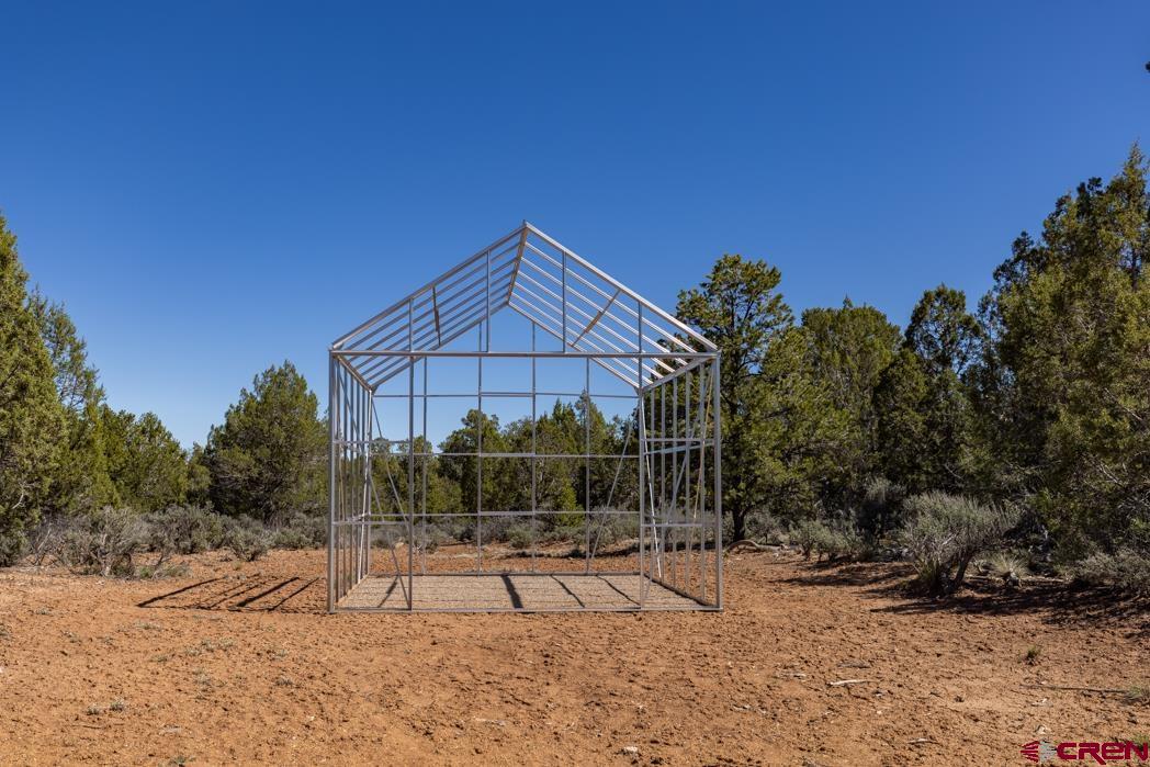553 Cow Canyon Road Ignacio, CO 81137 - Photo 20 of 34 a view of a house with a yard