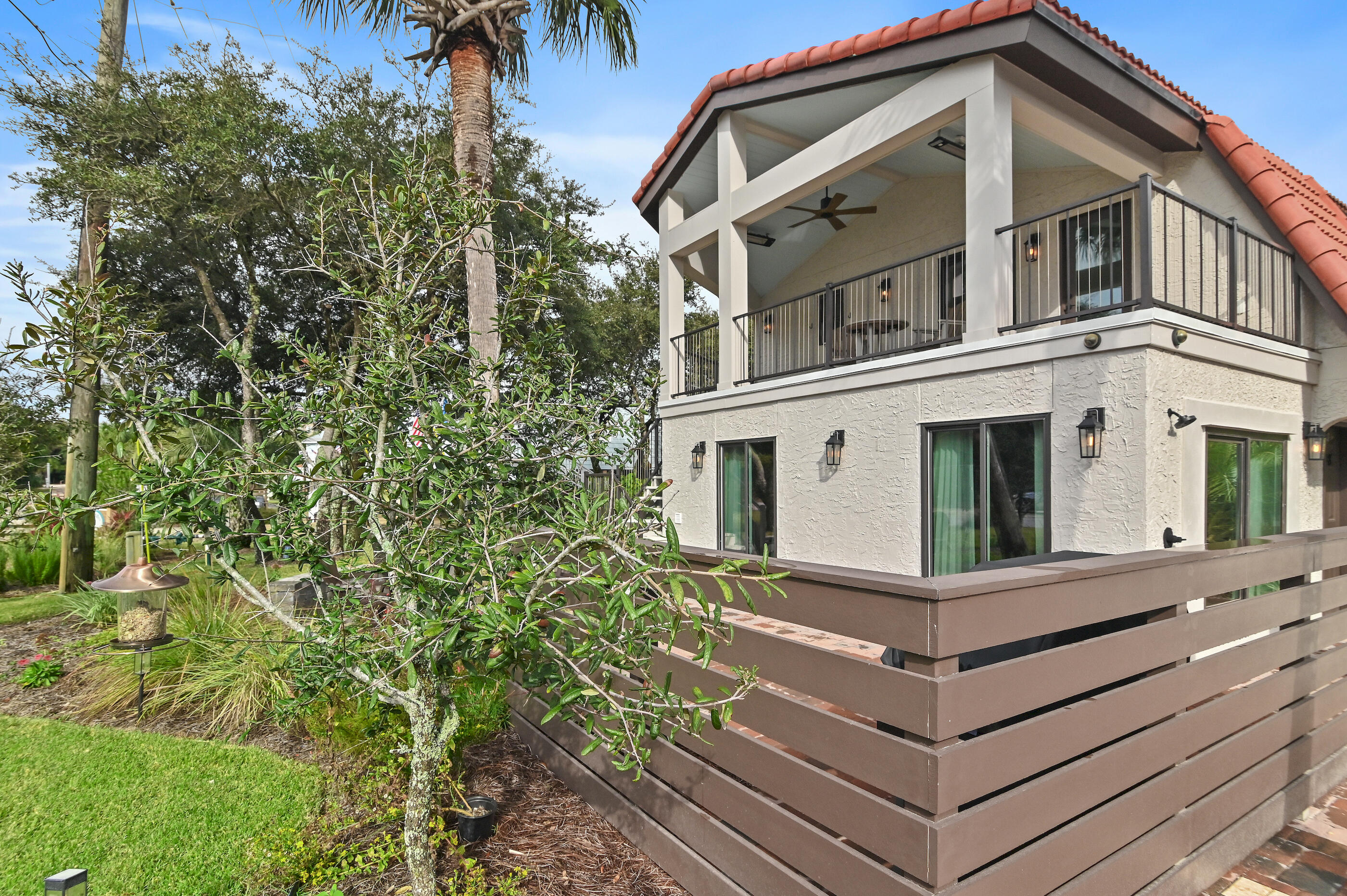 255 Blue Mountain Road, Unit 8 Santa Rosa Beach, FL 32459 - Photo 13 of 53 a front view of a house with a yard