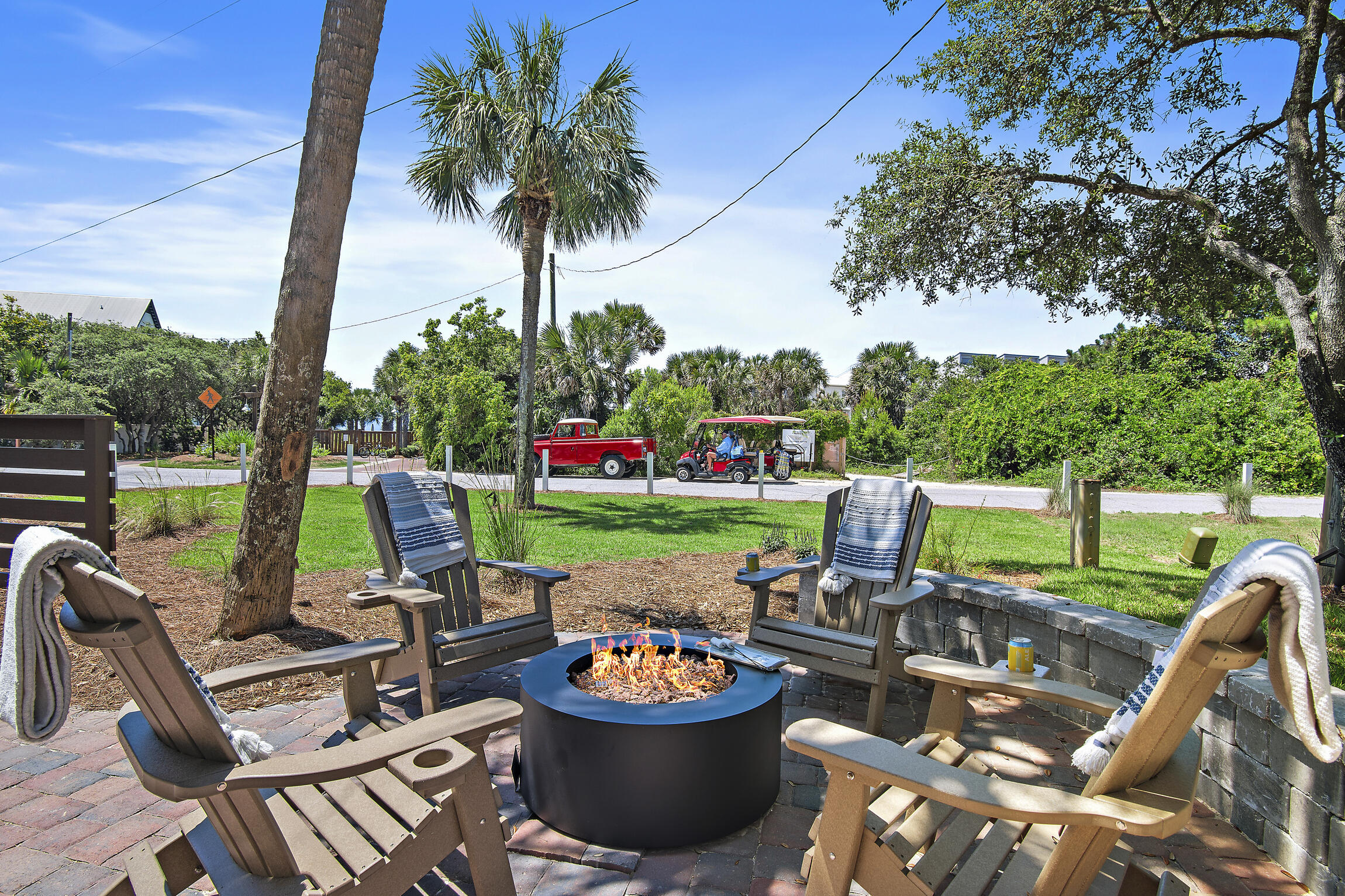 255 Blue Mountain Road, Unit 8 Santa Rosa Beach, FL 32459 - Photo 14 of 53 a table and chairs with the view of lake in the background