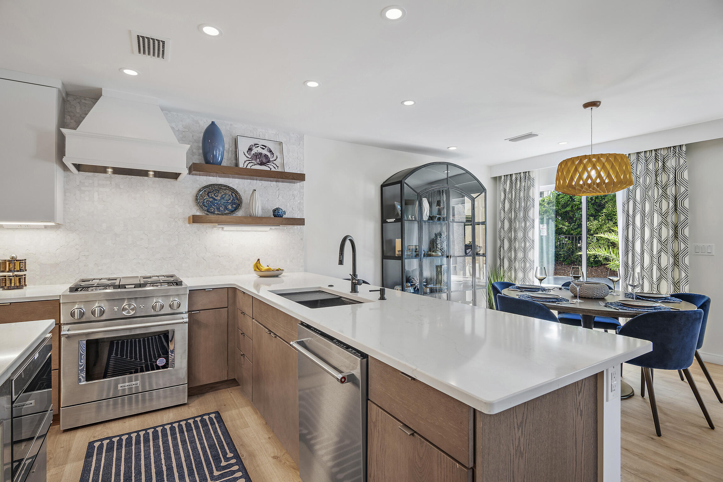 255 Blue Mountain Road, Unit 8 Santa Rosa Beach, FL 32459 - Photo 21 of 53 a kitchen with stainless steel appliances granite countertop a stove a sink and a microwave