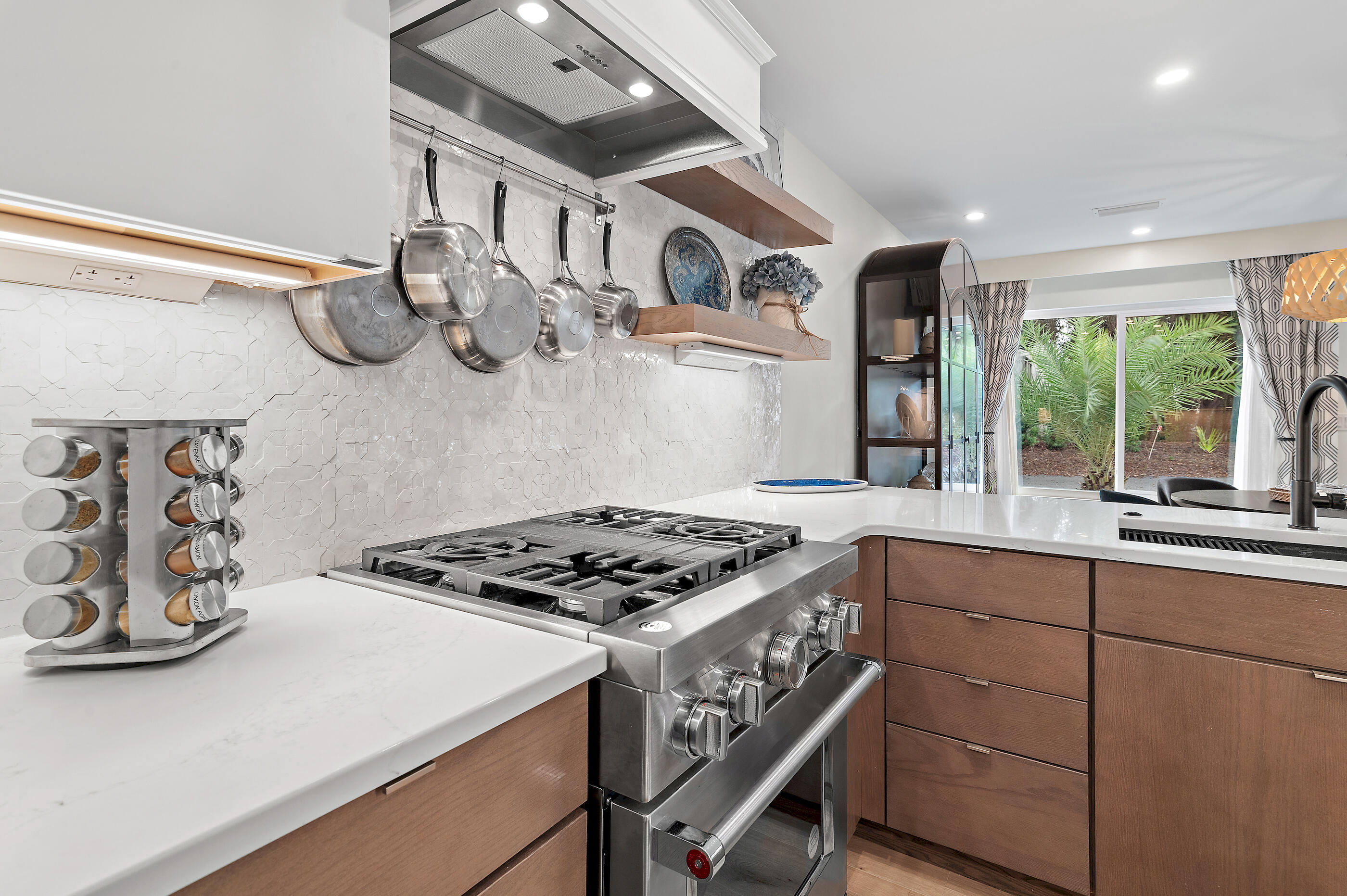 255 Blue Mountain Road, Unit 8 Santa Rosa Beach, FL 32459 - Photo 24 of 53 a kitchen with stainless steel appliances granite countertop a stove and a sink