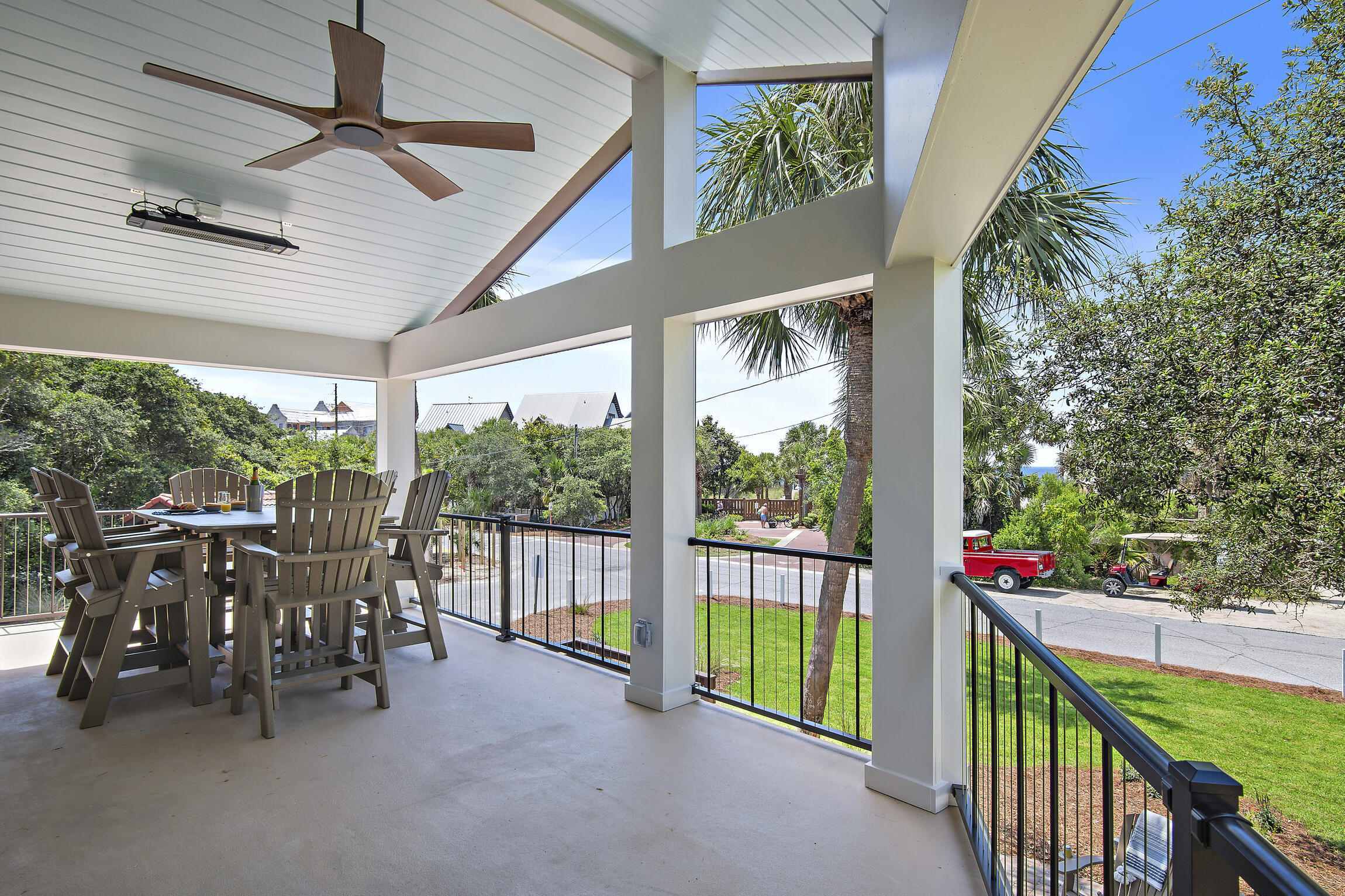 255 Blue Mountain Road, Unit 8 Santa Rosa Beach, FL 32459 - Photo 31 of 53 a view of a porch with furniture and garden