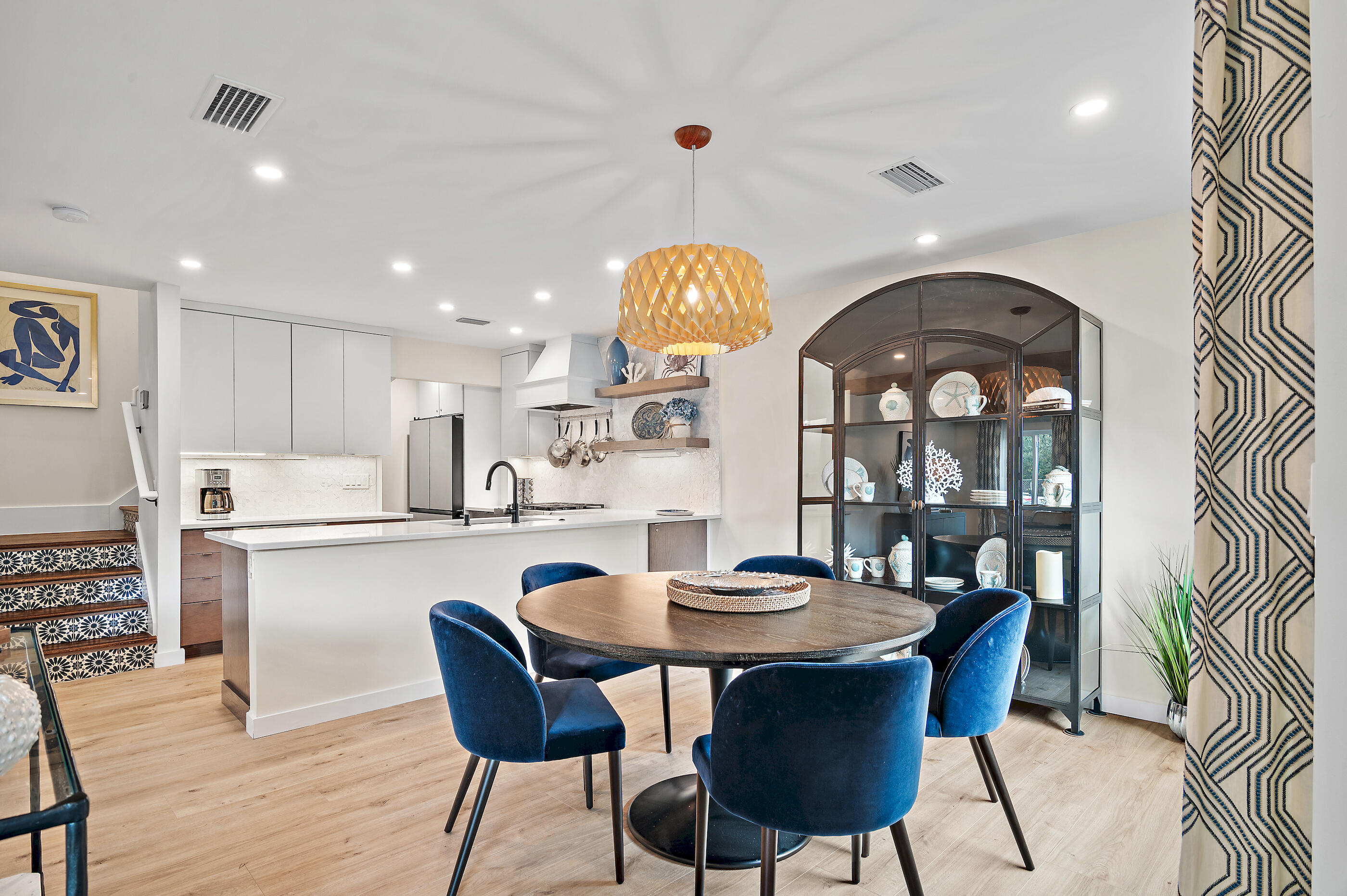 255 Blue Mountain Road, Unit 8 Santa Rosa Beach, FL 32459 - Photo 7 of 53 a view of a dining room with furniture and chandelier