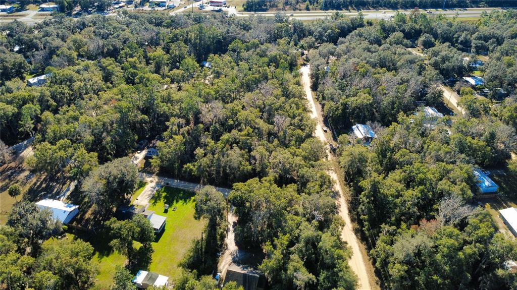 110 Leeward Road Satsuma, FL 32189 - Photo 12 of 18 an aerial view of residential house with swimming pool and green space