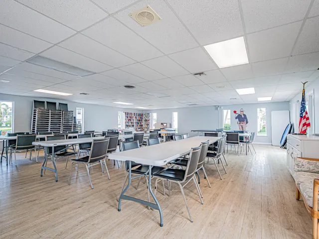 a table and chairs in front of a house