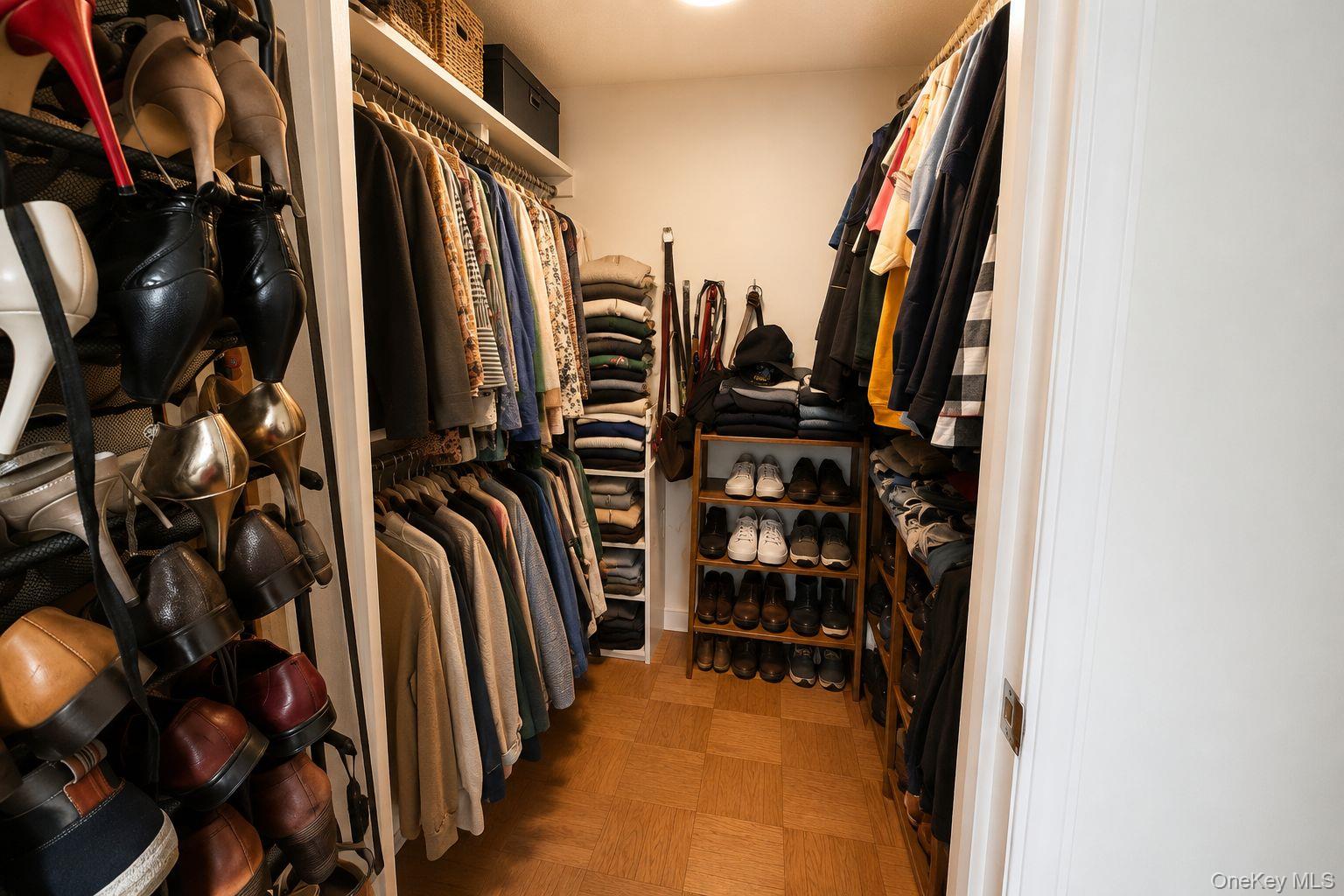 160 Academy Street, Unit 3J Poughkeepsie, NY 12601 - Photo 9 of 14 a view of walk in closet with clothes and shoes