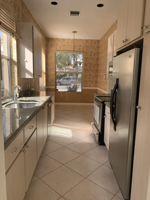 194 Hampton Place Jupiter, FL 33458 - Photo 6 of 12 Kitchen into Breakfast area
