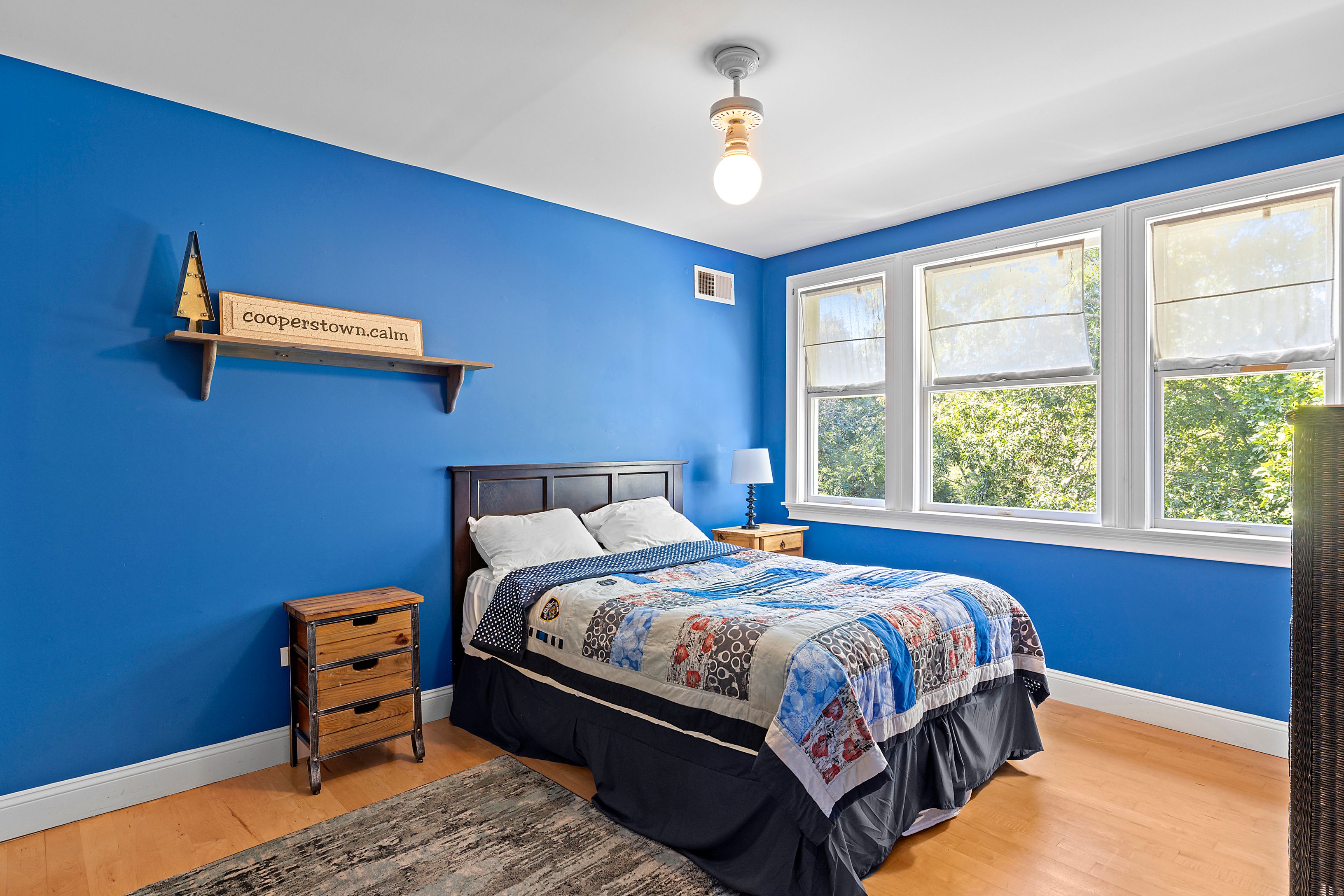 4 Bayberry Road Montauk, NY 11954 - Photo 16 of 29 a bedroom with a bed and a window
