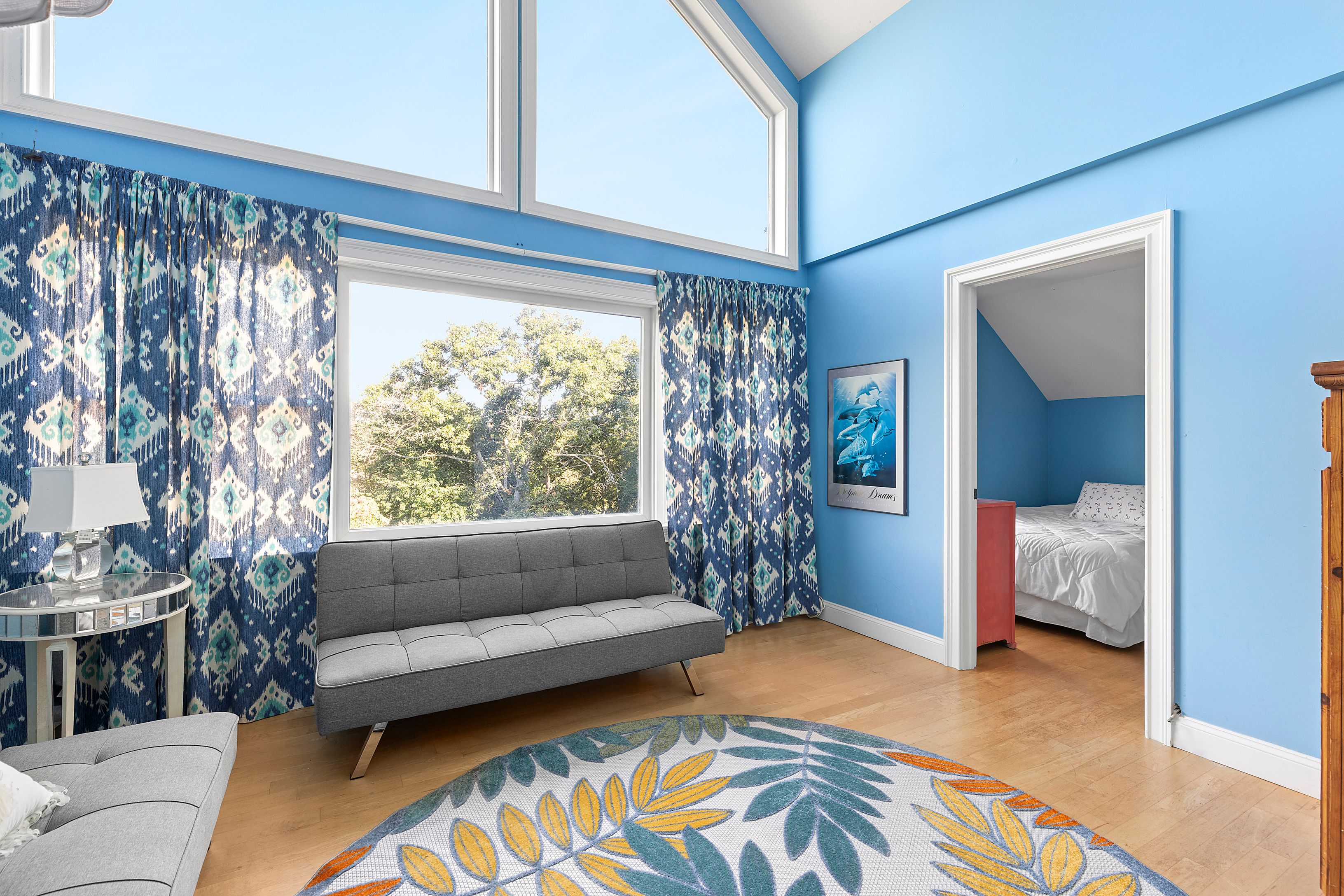 4 Bayberry Road Montauk, NY 11954 - Photo 18 of 29 a living room with furniture and a large window