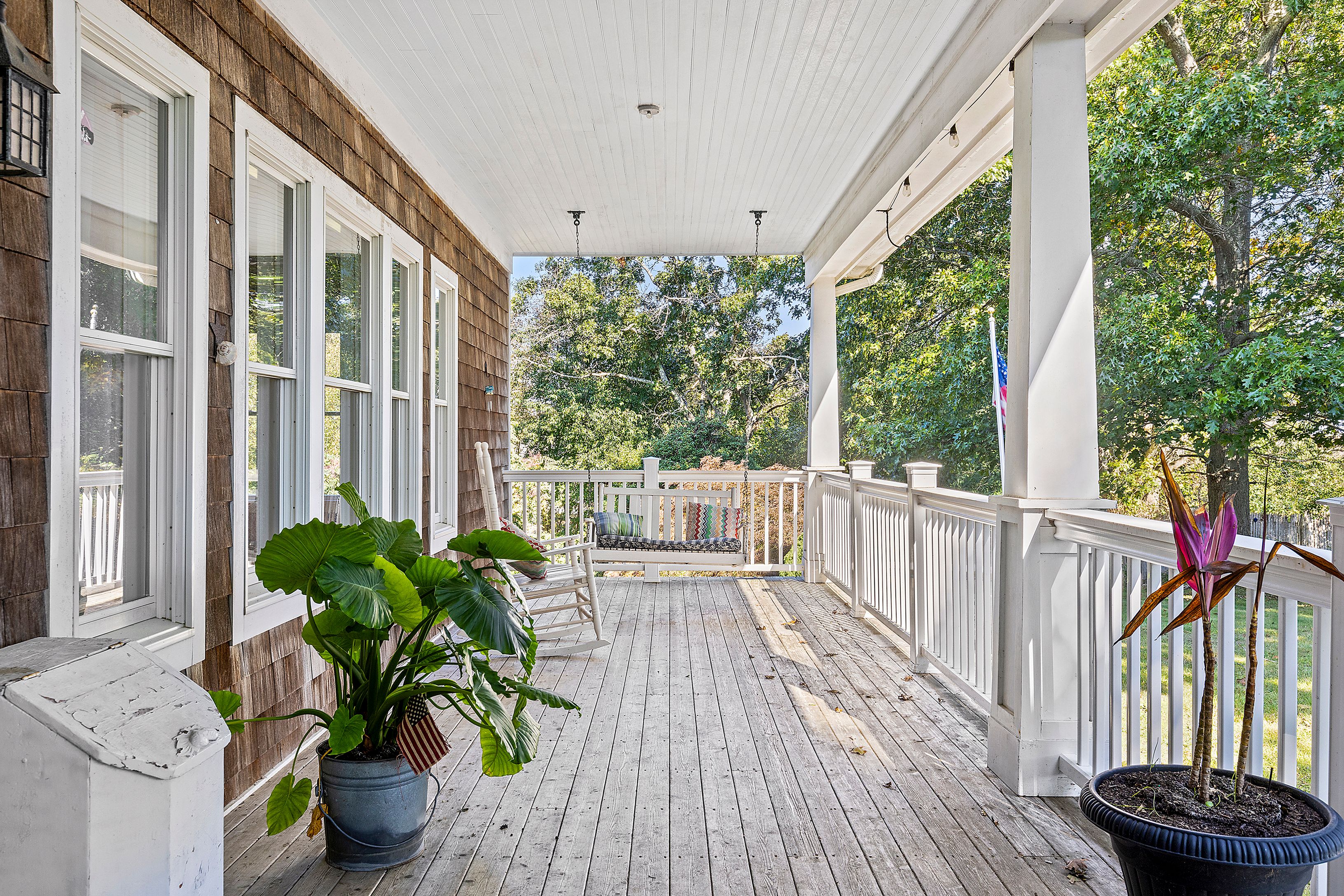 4 Bayberry Road Montauk, NY 11954 - Photo 4 of 29 a view of a balcony with potted plants