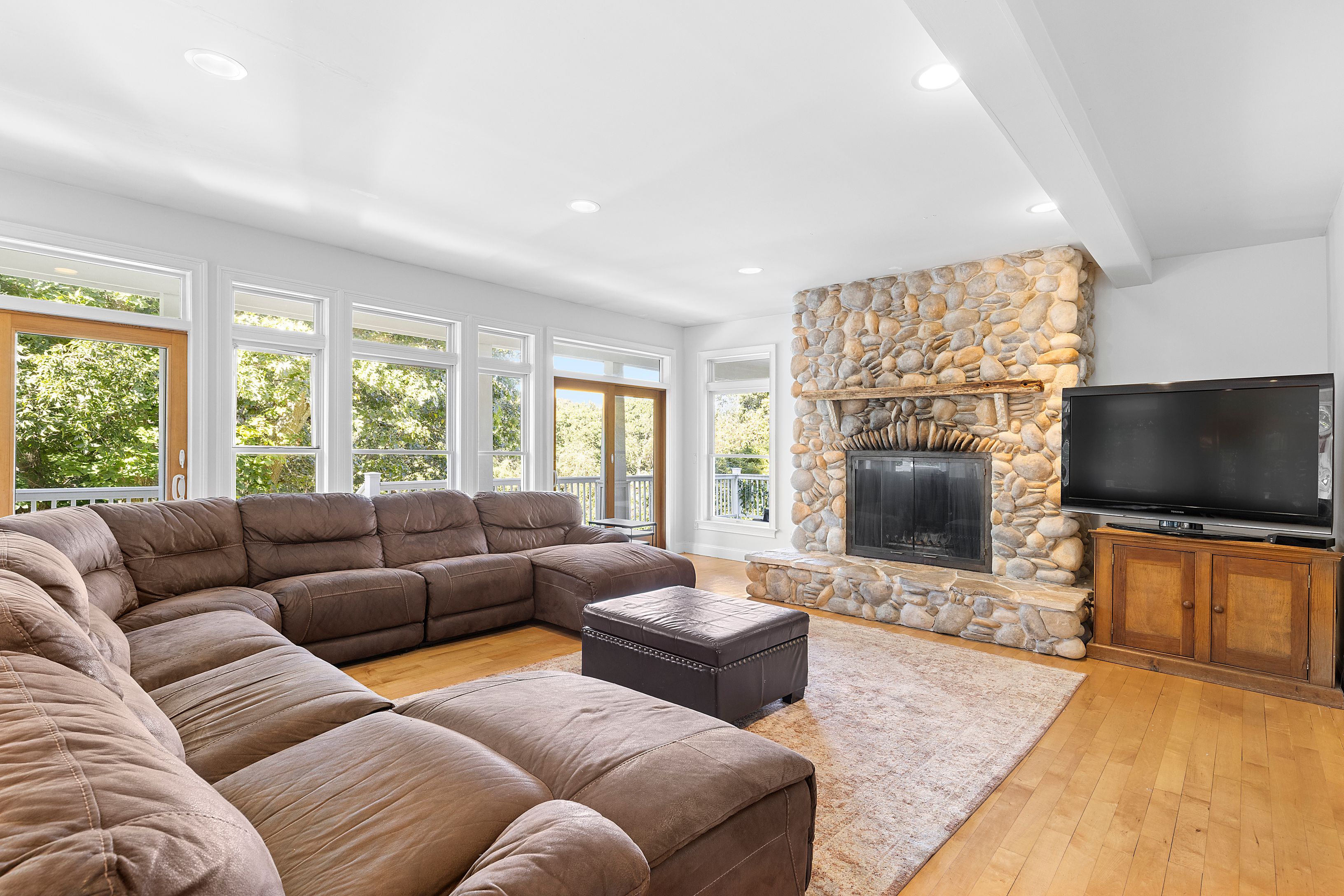 4 Bayberry Road Montauk, NY 11954 - Photo 9 of 29 a living room with furniture and a flat screen tv