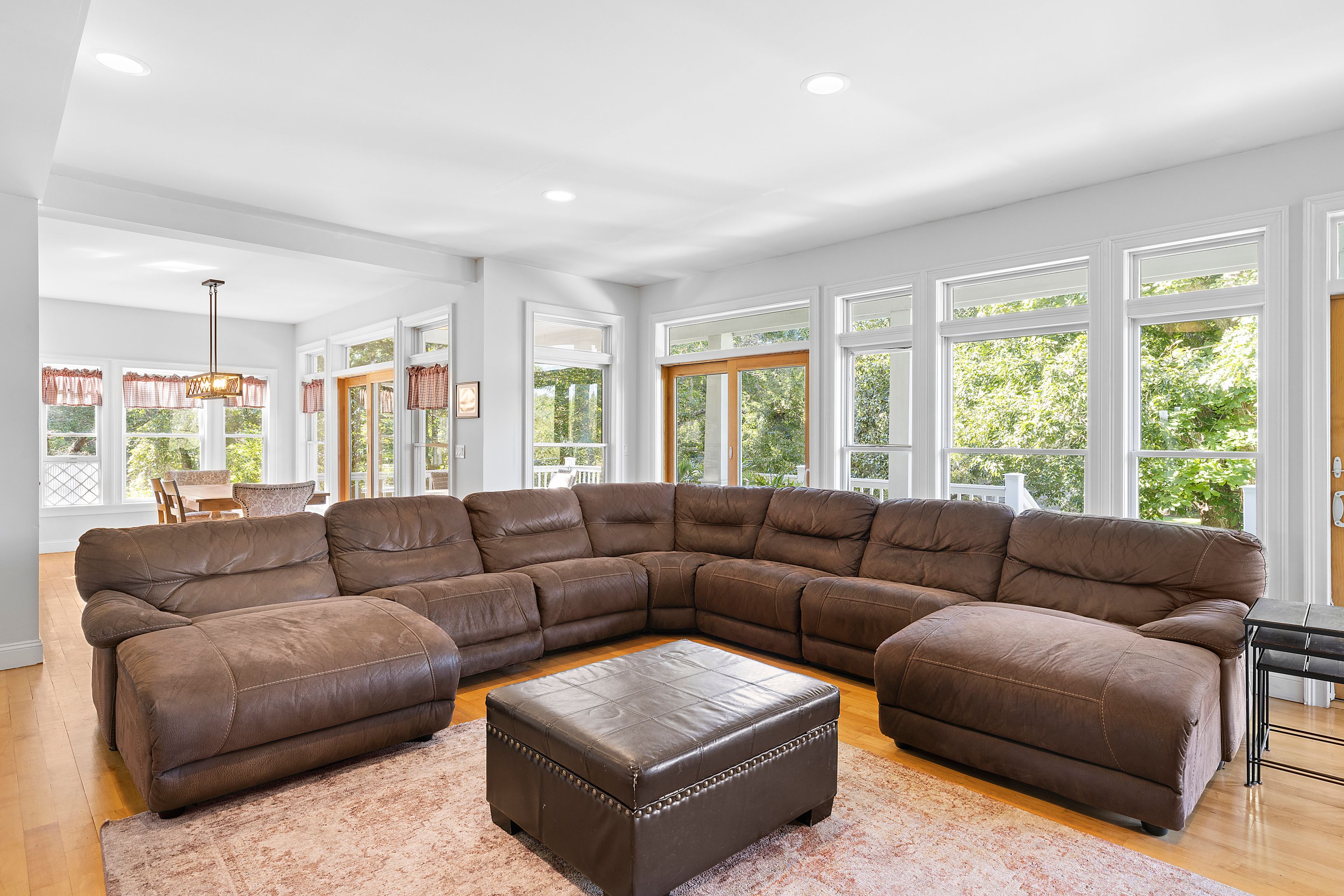 4 Bayberry Road Montauk, NY 11954 - Photo 10 of 29 a living room with furniture and large windows