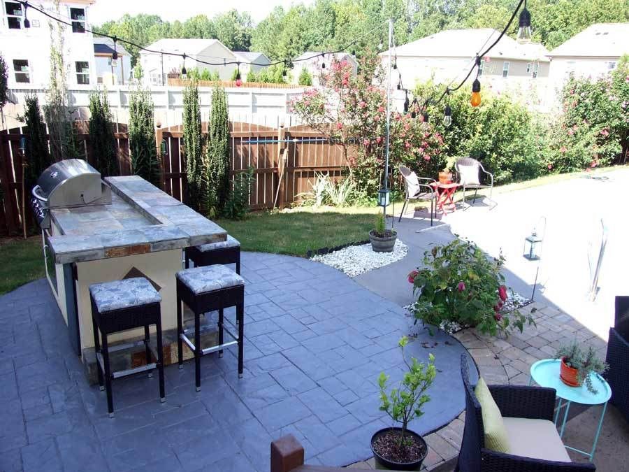 1209 Barnford Mill Road Wake Forest, NC 27587 - Photo 20 of 25 Go down the steps from the porch into your backyard oasis. Outdoor Kitchen
