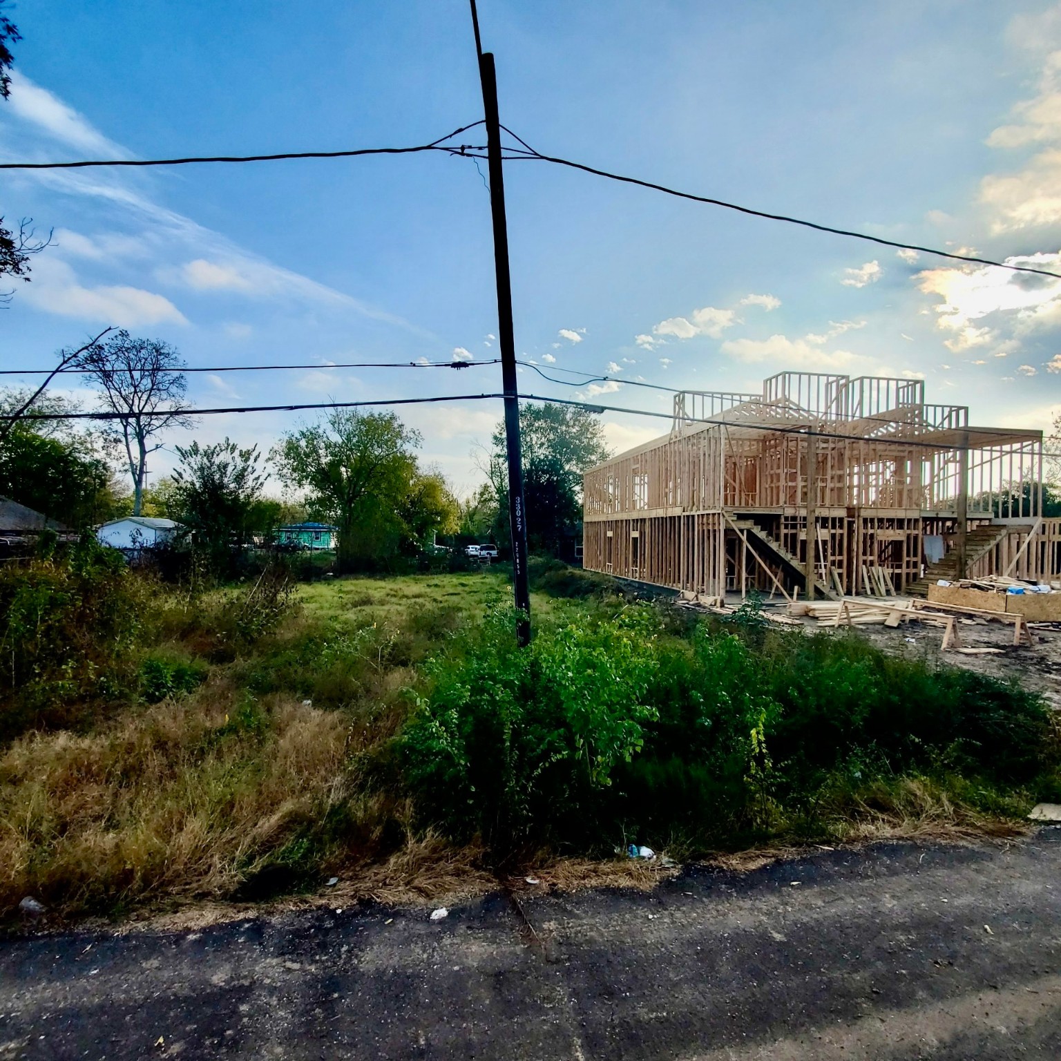 0 Bolden Street Houston, TX 77029 - Photo 8 of 8 a view of a city street next to a yard