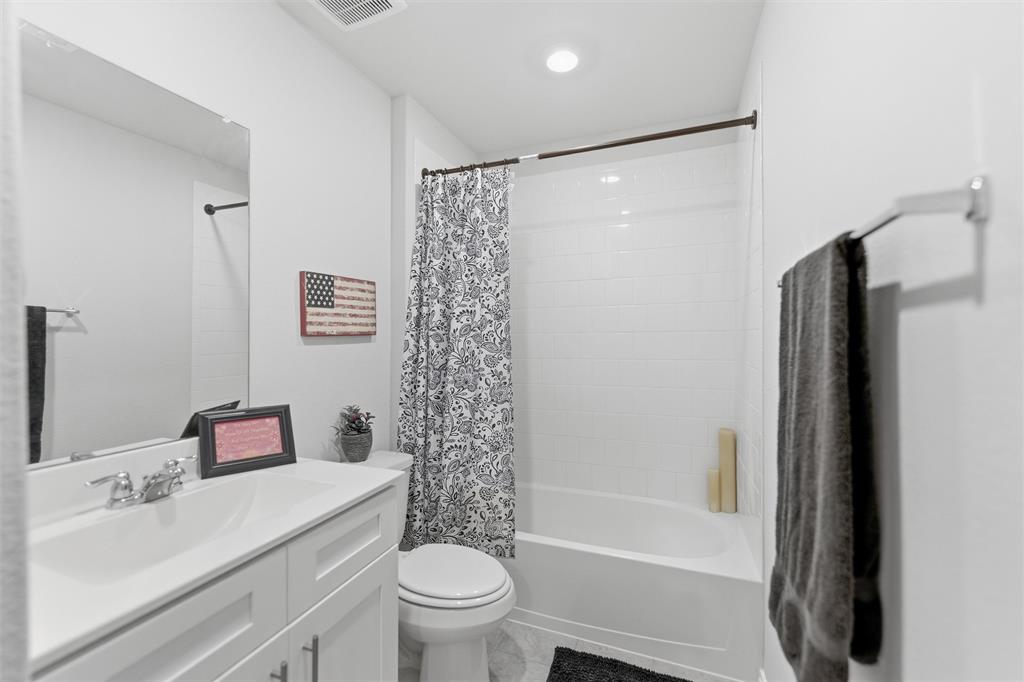 316 Sculptors Crossing Springtown, TX 76082 - Photo 4 of 19 a bathroom with a sink toilet and shower