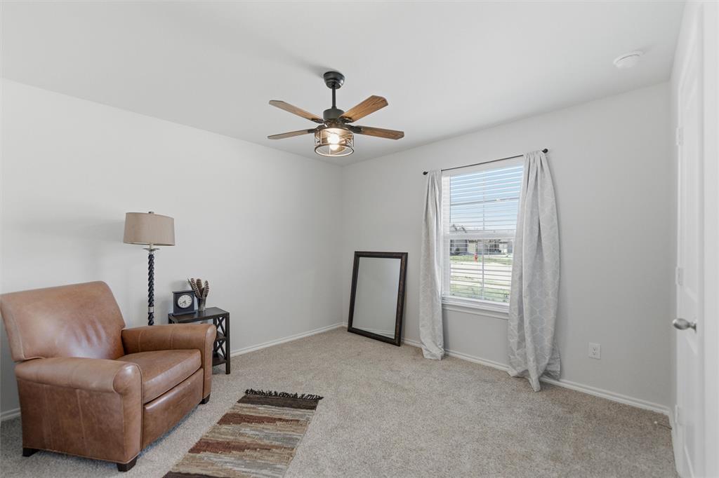 316 Sculptors Crossing Springtown, TX 76082 - Photo 5 of 19 a living room with furniture and a ceiling fan