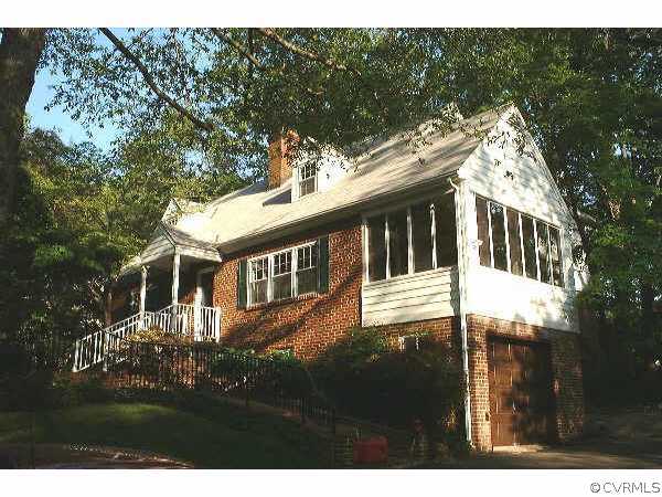 7731 Brookside Road Richmond, VA 23229 - Photo 4 of 7 a front view of a house with a garden