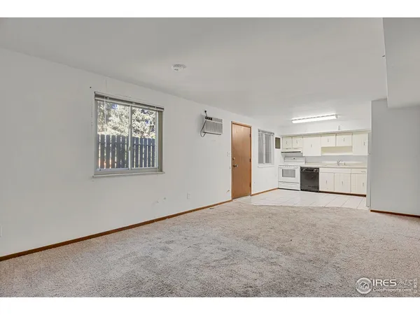 a big room with closet and windows