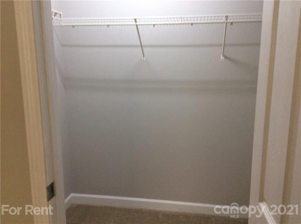6614 Bevington Ridge Road, Unit B Charlotte, NC 28277 - Photo 14 of 16 a view of small space with racks on the wall