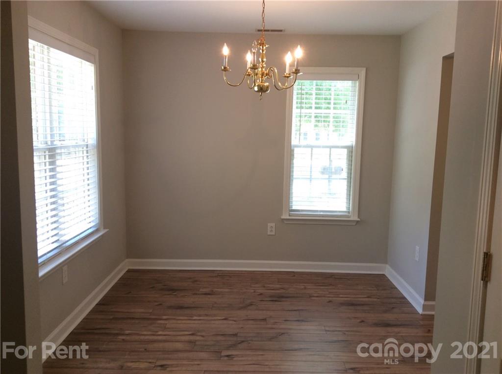 6614 Bevington Ridge Road, Unit B Charlotte, NC 28277 - Photo 8 of 16 a view of livingroom with window