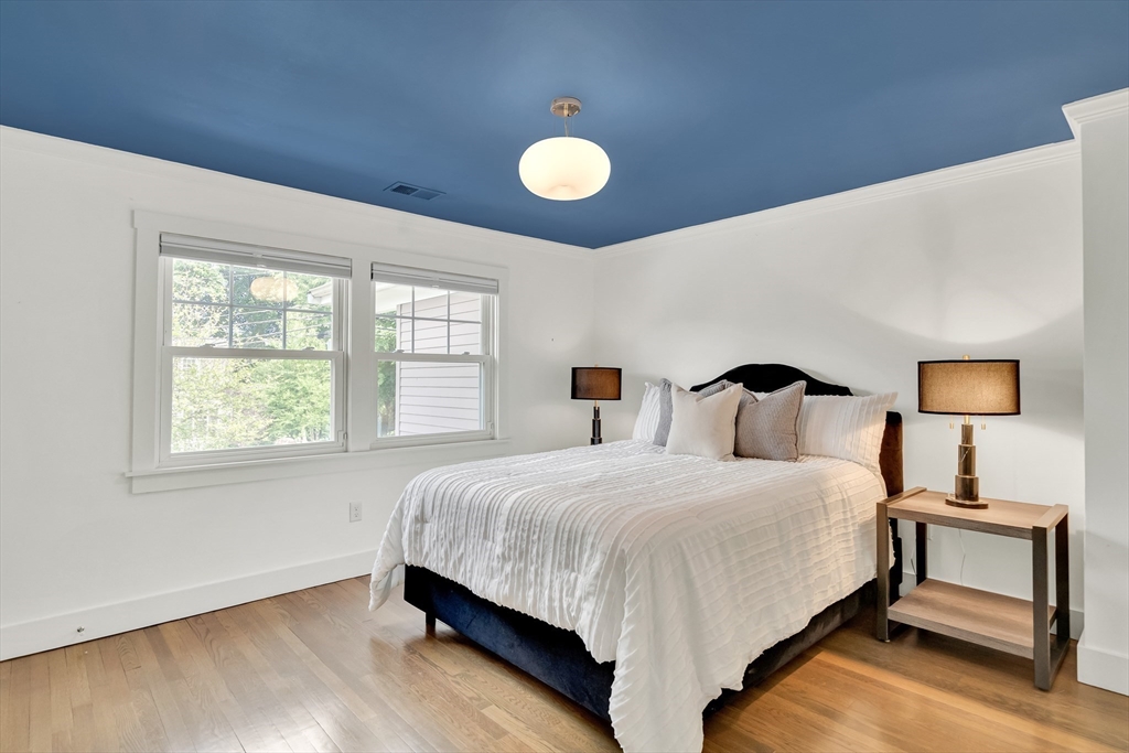 20 Lila Road Boston, MA 02130 - Photo 17 of 28 a bedroom with a bed and window