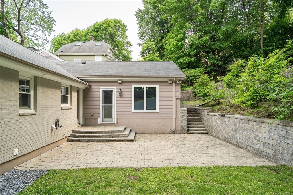 20 Lila Road Boston, MA 02130 - Photo 27 of 28 a house with trees in the background
